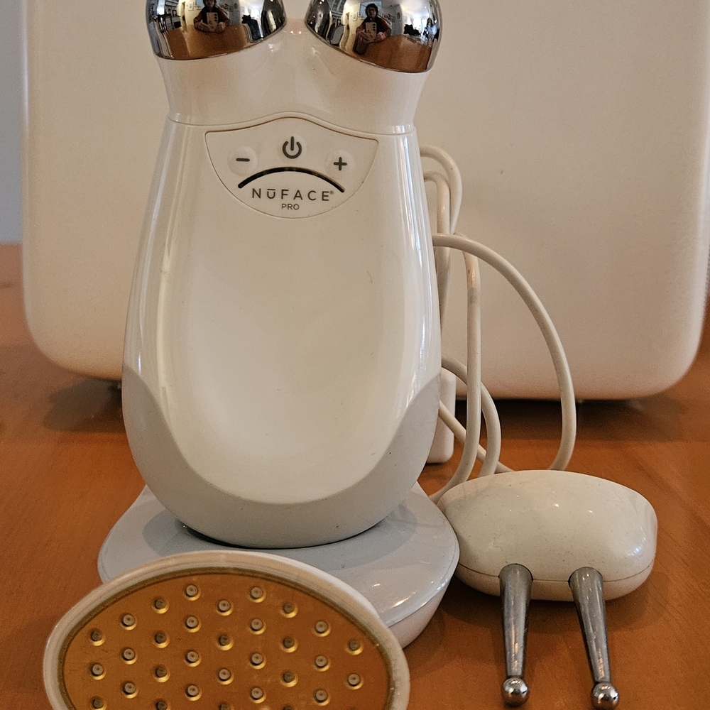 NuFace Pro Facial Toning Device in White with Silver Rollers and Gold LED Head
